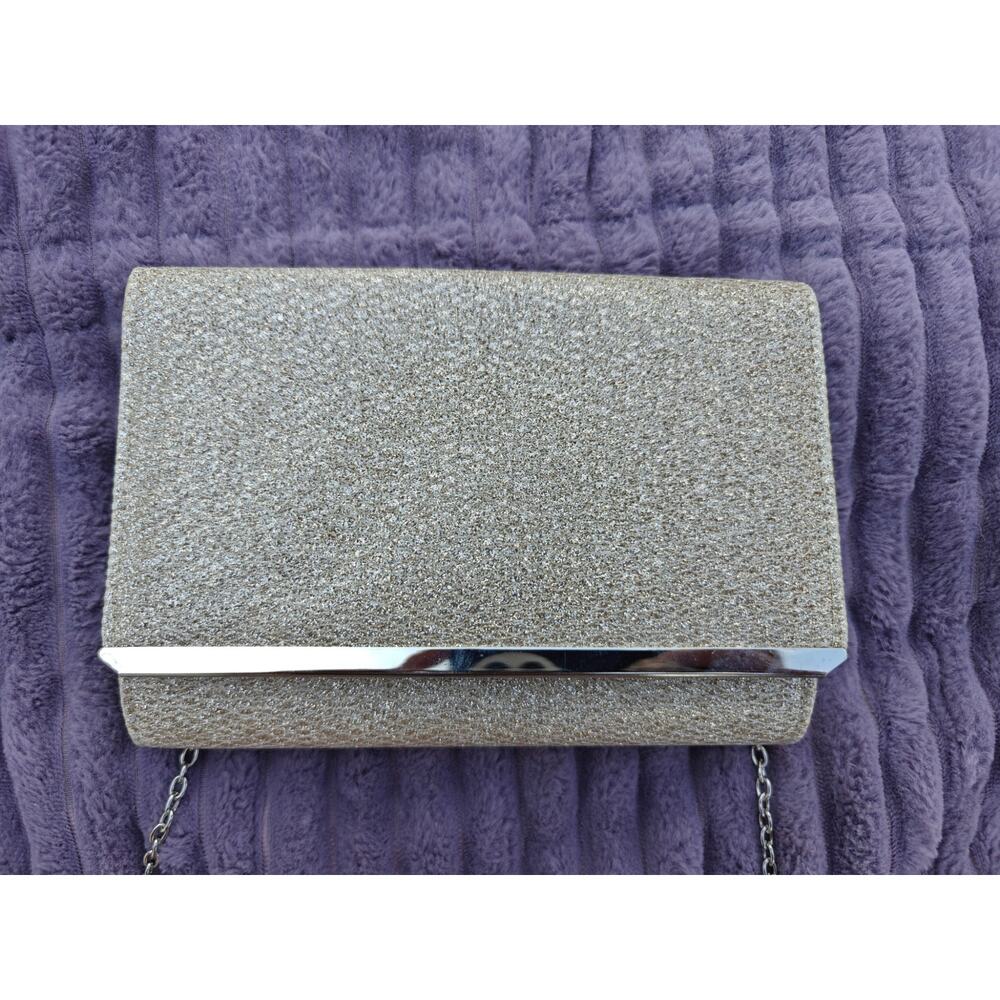 Gold glittered clutch purse.